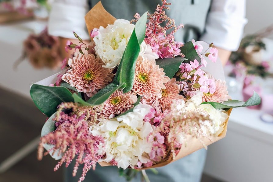 closeup of pink and peach wedding bouquet